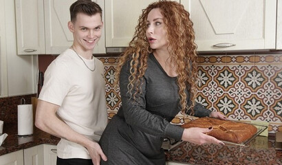 Curly-haired housewife Tanya Foxx screws a teen neighbor in the kitchen