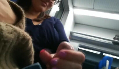 Nerdy stranger takes care of my dick in the train