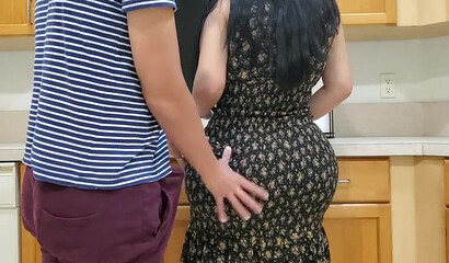 Amateur mom with big tits & ass seduces a stepson in the kitchen