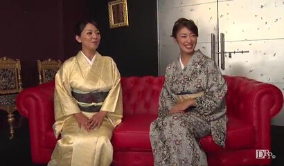 美丽的日本女士亲热与年轻的绅士