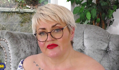 Chubby British mature Candy Cummings teases big-dicked black guy