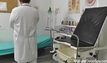 Voyeur doctor secretly films chubby mommy on her gyno exam