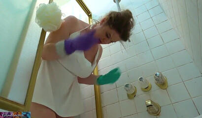 As the stepmom cleans the bathtub a cock ends up fucking her